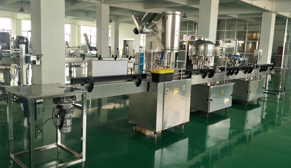 Automatic bottle filling and capping line